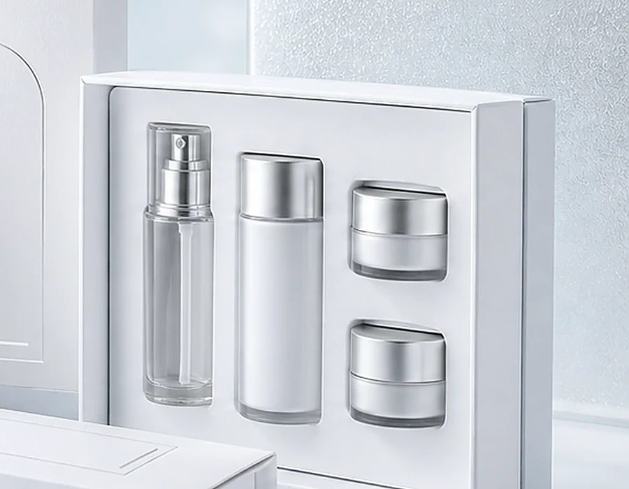 Cosmetic set box insert holding bottles and jars in a white tray