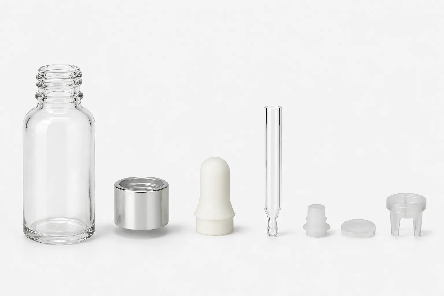 Exploded cosmetic dropper bottle system showing bottle neck collar bulb pipette tip and optional wiper